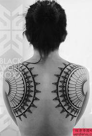 Good looking back totem tattoo picture of male back