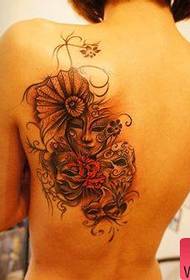 Даволі папулярны малюнак татуіроўкі венецыянскай маскі на спіне дзяўчыны