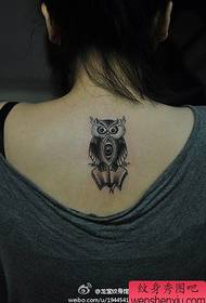 Girl's back very cute owl tattoo pattern