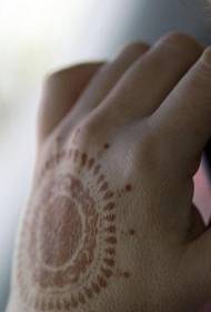 Hand back sun indian symbol tattoo pattern