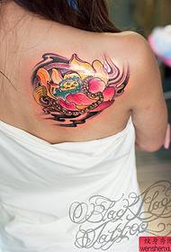 a back colored lotus tattoo pattern