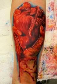 Arm color realistic bloody heart tattoo pattern