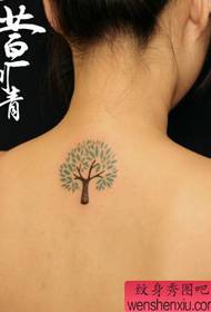 Girl's back nice totem tree tattoo pattern