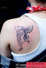 Girl back with nice wolf head and butterfly wings tattoo pattern