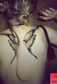 Small fresh woman back wings tattoo works