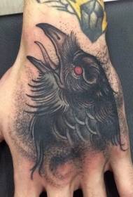 Black delicate red eyed crow tattoo pattern on the back of the hand
