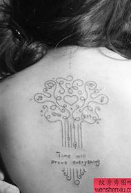 Girl's back alternative totem tree tattoo pattern