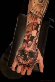 Цвят на ръката окървавен модел на татуировка на черепа