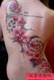 Kaʻi i ke kiʻi pattern cherry tattoo back