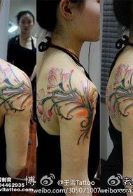 Beautiful arm to shoulder, beautiful colored floral tattoo pattern
