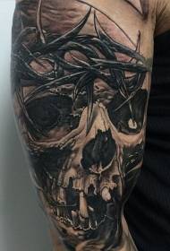 Grote arm zwart grijze stijl schedel met wijnstok tattoo patroon