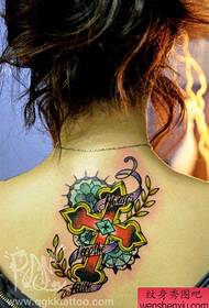 Beautiful back cross tattoo pattern for girls