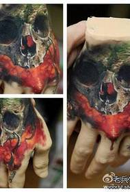 Popular back skull tattoo pattern on the back of the hand