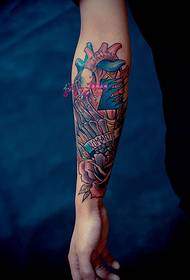 Beating heart alternative flower arm tattoo picture
