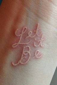 Padrão de tatuagem invisível em inglês no pulso