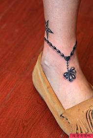 Tattoo-show, advisearje in foet-anklet tatoeëpatroon