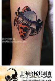 Female arm inside small plane tattoo pattern