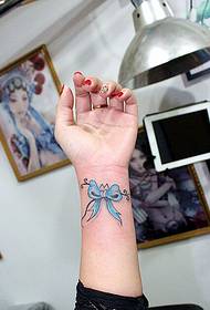 Beautiful hand-made bow tattoo pattern for fashion hand