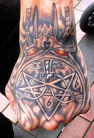 Hand back evil monster with cross tattoo pattern