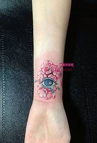 Vackra tårfulla ögon blomma tatueringsbilder