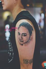 Boy arm girl portrait tattoo picture