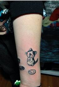 Cute beautiful looking cartoon kitten tattoo picture on wrist