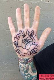 The best tattoo museum recommends a hand rose tattoo tattoo