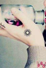 Female hand back cute sun tattoo picture