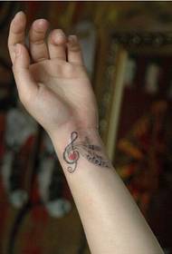 Nice-looking note tattoo picture picture on beautiful wrist