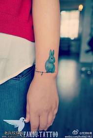 Female hand cartoon rabbit tattoo pattern