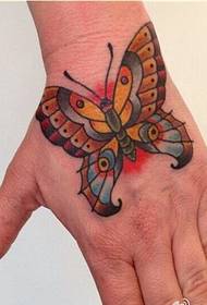 個性手美麗的蝴蝶紋身圖案圖片