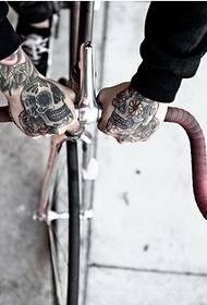 Foreign bike racer hand skull tattoo picture