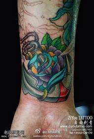 Wrist color anchor rose tattoo