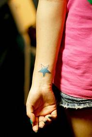 Fresh blue little star wrist tattoo picture