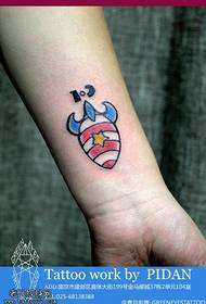Wrist color rocket tattoo