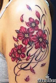 Flower tattoo pattern picture on girl's big arm