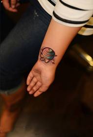Colored little lollipop wrist tattoo pictures