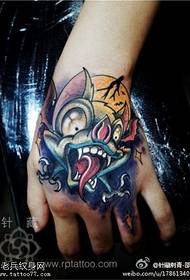 Color hand back small bat tattoo work