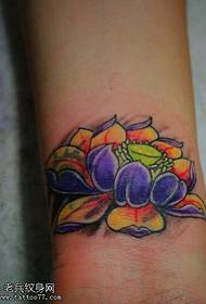 Wrist colored traditional lotus tattoo pattern
