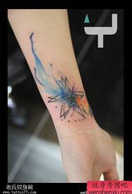 Hand color splash ink five-pointed star tattoo works