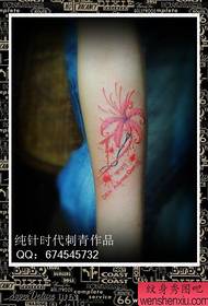 Girl's arm beautiful looking good flower and letter tattoo pattern