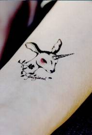 Female hand beautiful and beautiful deer tattoo picture
