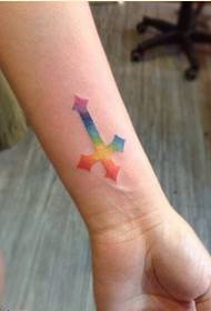 Female beautiful wrist nice looking colorful cross tattoo picture