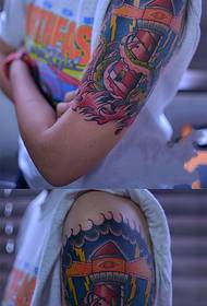 Creative lighthouse with sea monster flower arm tattoo pictures