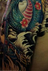 Colorful half-hearted dragon tattoo