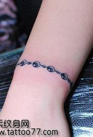 Убава и популарна шема на тетоважи со нараквица за рака