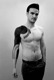 Stylish male must-have handsome half armor tattoo