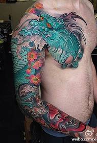 Машка личност, тетоважа со полу-змеј