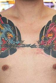 Two fierce evil dragons with a murderous half armor tattoo