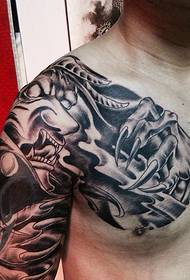 Black and white half armor tattoo picture